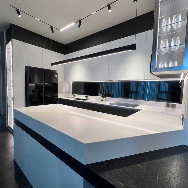 Kitchen island in Bangkok - Silestone Calacatta Gold with Black Ice Antolini Marbles.jpg